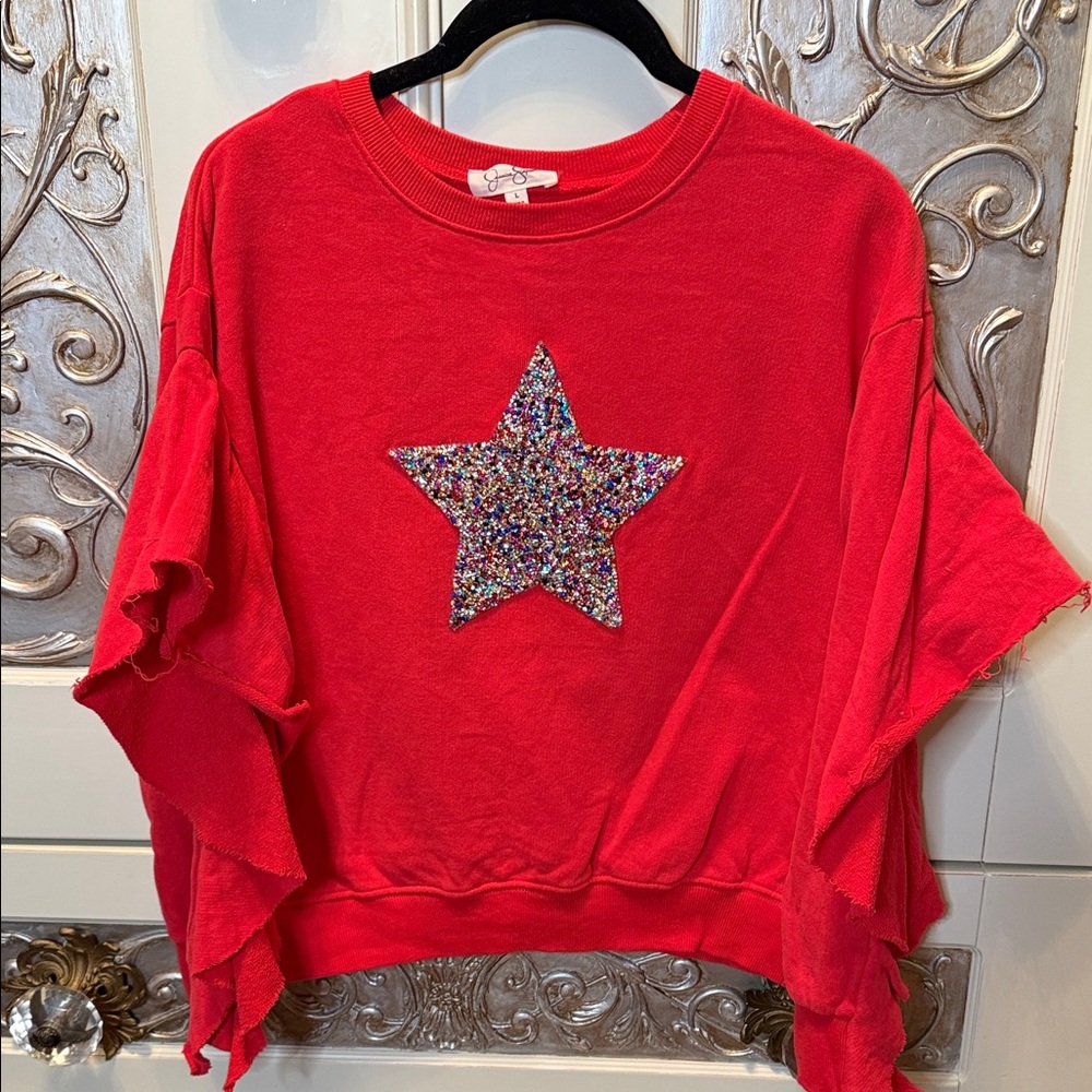 EUC Jessica Simpson sweatshirt w/multi-color sequined star size L